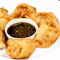 Dumplings · Steamed or deep fried dumplings with a filling of pork, vegetables, ginger, and garlic. Serv...
