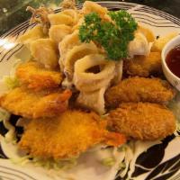 Fried Seafood Combo · Crispy fried prawns, fried oysters, and salt and pepper calamari served with our sweet and s...