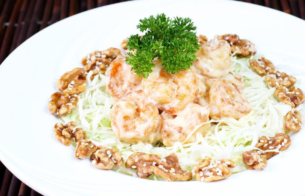 Honey Walnut Prawns · Fried prawns enveloped in a creamy sauce and served with house-made honey walnuts.