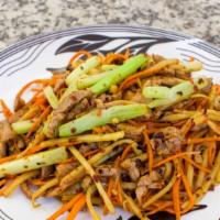Shredded Pork with Celery · Pork stir-fried with celery, carrots and bamboo shoots in a spicy ginger sauce.