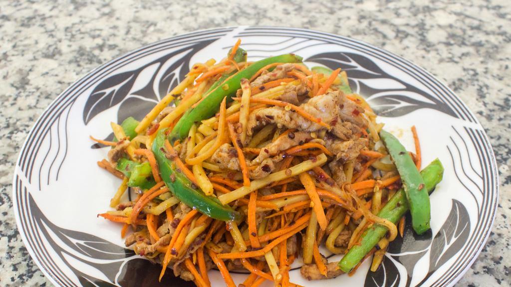 Shredded Pork with Vegetables · Crispy silvers of pork cooked with bamboo shoots, bell peppers and carrots in a spicy and savory bean sauce.
