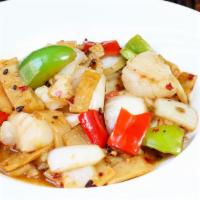 Old Country Scallops/Shrimp · Large scallops stir-fried with bell peppers, bamboo shoots and onions in a hot black bean sa...