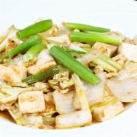 Hunanese Tofu · Green onions and tofu stir-fried in a white wine sauce.