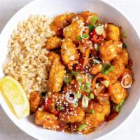Orange Chicken 2.0 · Antibiotic-free, oven-fried chicken with peppers & onions, green onions, sesame seeds, and o...