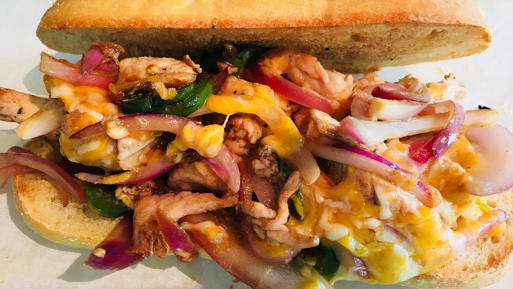 Chicken Phylli Sandwich · Sautéed chicken breast with onion, jalapeno and mixed cheese served on a French roll.