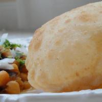 Chana Bhatura · Soft, leavened refined flour bread deep fried. Served with chana masala.