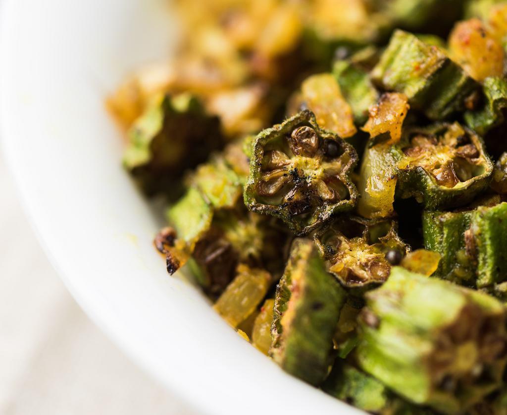 Okra Fry  · Your choice of vegetable diced, lightly fried in a mix of onions and herbs, and tempered with mustard and red chilies.