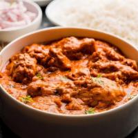 Chicken Tikka Masala · Chicken breast cooked in the tandoor and blended with tomatoes, cream, and house spices.