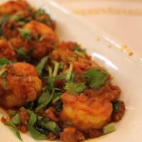 Royyala Vepudu · Prawn fry. prawns tossed in a blend of rich spices, onions, and tomatoes served dry.