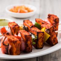 Paneer Tikka Kabab · Indian cottage cheese squared, marinated, and cooked in the tandoor.