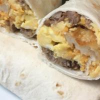 Country Breakfast Burrito · Sausage, Egg, Potatoes, country gravy wrapped in a flour tortilla
