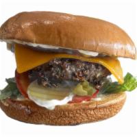 Hamburger · 1/3 lb Burger with lettuce, tomato, pickle, and onion. Served with French Fries