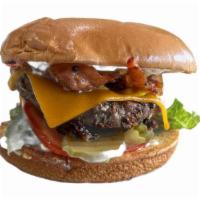 Bacon Cheeseburger · 1/3 lb Cheeseburger with bacon, lettuce, tomato, pickle, and onion. Served with French Fries