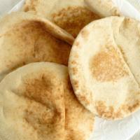 Small White Pitas · Six-inch diameter, six pita breads per bag. freshly made on a daily basis. No preservatives.