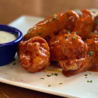 Buffalo · New York Style Wings Hand Tossed in Buffalo Sauce