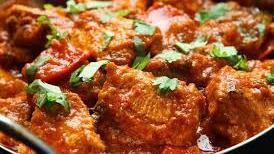 Kadai Chicken · Chicken cooked in onion sauce made w/special Indian spices, onions & bell peppers.