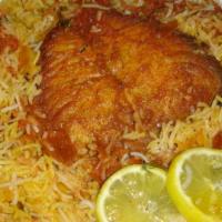 Fish Biryani · A mixture of aromatic basmati rice, Indian herbs, fish and our famous hyderabadi biryani mas...