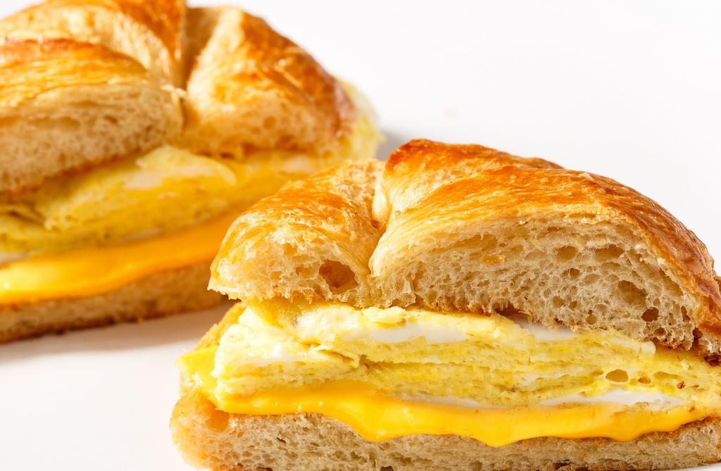 Egg & Cheese Croissant Sandwich · Oversized Croissants with a thick layer of Egg and Cheese. Choose any meat to add