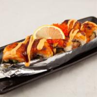 Lion King · Top: baked salmon, tobiko with spicy mayo and unagi sauce.