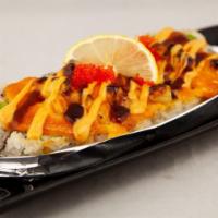 Bay Island · In: CA roll. Top: baked scallops, tobiko with spicy mayo and unagi sauce.