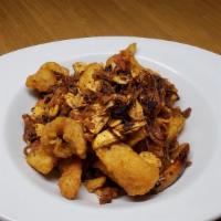 Chili Fish (Bar La Chong) · Stir-fried catfish fillet, chili flake, onion, garlic, fish sauce and ginger.