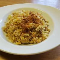 Burmese Style Fried Rice · Tender whole yellow beans steamed for hours with fried jasmine rice, onion and egg, topped w...