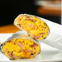 The Classic · Choice of bacon, sausage, ham or chicken, scrambled eggs and melted cheese.