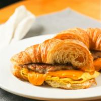 Meat, Egg & Cheese Sandwich · Choice of bacon, sausage or ham, two eggs and cheese.