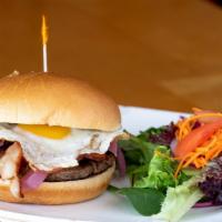 Morning Burger · Roasted garlic aioli, smoky bacon, melted cheddar, pickled red onions and a sunny-side up egg.
