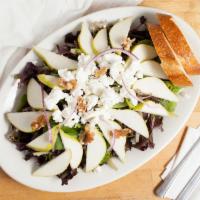 Pear and Goat Cheese Salad · With mixed greens, sliced pears, roasted walnuts, onions and goat cheese tossed in honey dij...