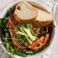 House Salad · Mixed greens, avocado, pea sprouts, carrots, cucumbers, onions and tomato tossed in balsamic...