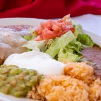 Chile Relleno Flame Roasted Pepper Platillo · With rice, beans, lettuce, tomatoes, guacamole, sour cream and tortillas.