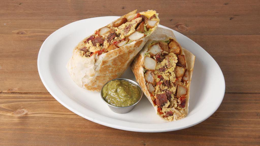 Manny's Breakfast Burrito * · your choice of pastrami or mushrooms, eggs, caramelized onions, roasted peppers, potatoes, melted cheese & smashed
avocado served with house-made tomatillo salsa