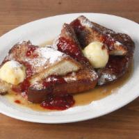 Challah French Toast * · served with maple syrup, berry preserves & orange butter