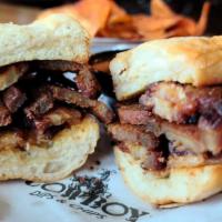 'Belly' (Pork Belly) · Pork Belly  Dip sandwich is served on butter toasted bun with Au Jus and homemade crispy thi...