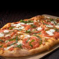 Margherita Pizza  · Fresh Mozzarella, Tomatoes, Fresh Basil