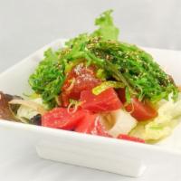 Poki Salad · Mixed shoyu poke or spicy aioli, white onions, tobiko, wakame, cucumber, sesame. choose your...