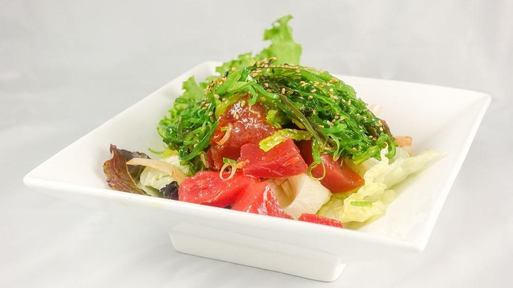 Poki Salad · Mixed shoyu poke or spicy aioli, white onions, tobiko, wakame, cucumber, sesame. choose your protein tuna or hamachi or salmon or tako.