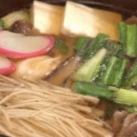 Beef Udon · Daishi broth with sliced beef, veggies, and scallions.