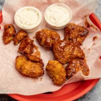 Boneless Wings (24 Wings) · Enjoy our Seasoned Boneless Wings tossed in your choice of sauce, or none at all, and served...