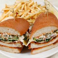 Fried Chicken Sandwich · Crispy Buttermilk Fried Chicken Breast with Swiss, House Coleslaw, and Chipotle Aioli on a H...