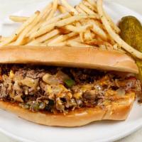 Angus Cheese Steak Sandwich · Grilled Angus Beef, American Cheese, Caramelized Mushrooms, Onions & Bell Peppers On a Hoagi...