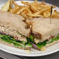 Albacore Tuna Salad Sandwich · Tuna Salad, Lettuce, Tomato, Red Onions, on Country Bread with Mayo.  Served with French Fri...