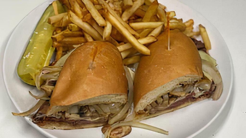 Steak Sandwich · Grilled New York Strip Steak with Swiss Cheese, Caramelized Onion & Mushrooms on Garlic Hoagie Roll

Served with French Fries and a Pickle Wedge