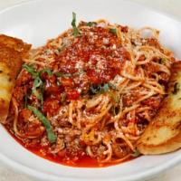 Spaghettini Bolognese · Classic Meat Sauce (Italian Sausage & Ground Beef) Fresh Basil & Parmesan