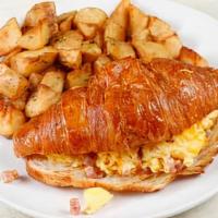 Croissant Sandwich · Two Eggs Scrambled with Smoked Pit Ham & Swiss Cheese in a Warm Croissant 

Served with Rose...