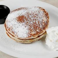 Buttermilk Pancakes · Three Buttermilk Pancakes with Powdered Sugar.  Served with 100% Maple Syrup
ADD ONE OF THE ...