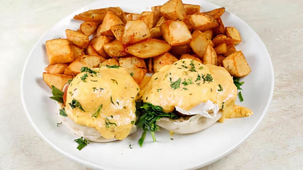 Florentine Benedict · Grilled Tomatoes & Spinach
Two Poached Eggs, Hollandaise Sauce On Toasted English Muffin 

Served with Rosemary Garlic Potatoes