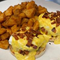 Burger Benedict · Angus Beef Patty, Grilled Tomatoes & Bacon 
Two Poached Eggs, Hollandaise Sauce On Toasted E...