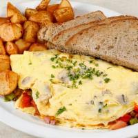 Fillmore Omelette · Three Eggs, Bell Peppers, Mushrooms, Tomatoes, Smoked Pit Ham & Swiss Cheese.  Served with C...